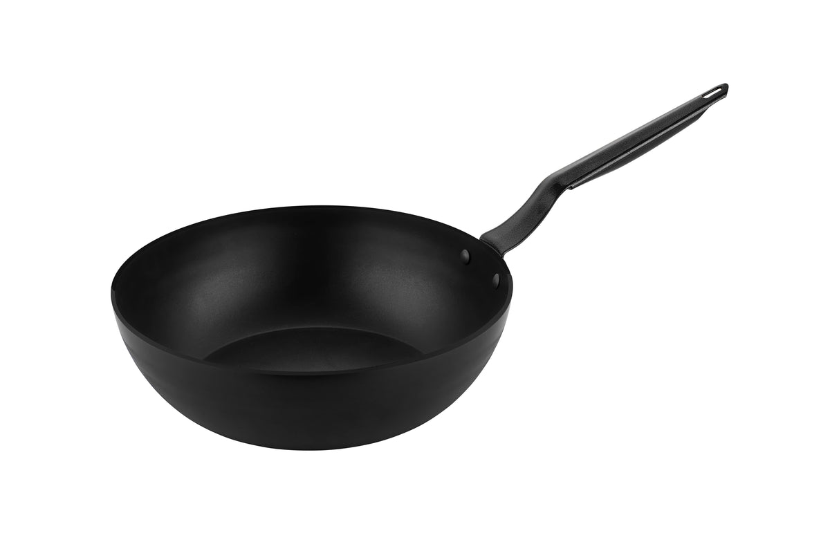 Deep black Papilla nonstick wok with riveted long handle, angled studio shot on white